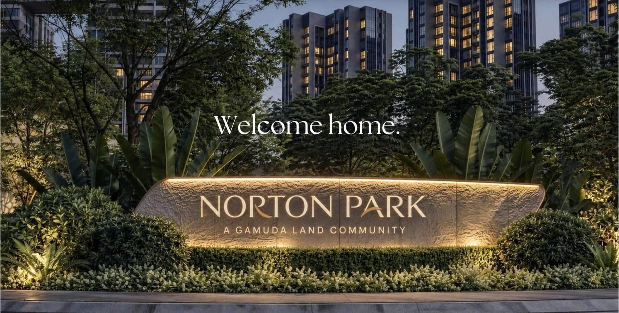 Biển tên dự án Norton Park A Gamuda Land Community trong cảnh quan cây xanh